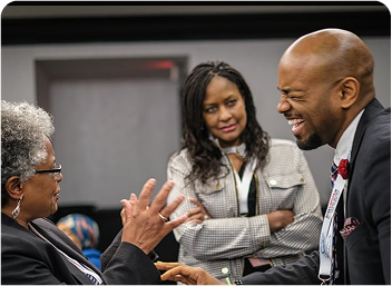 Three smiling NBL Members